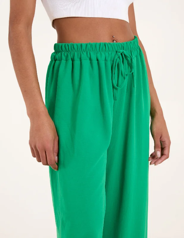 green-drawstring-wide-leg-trousers