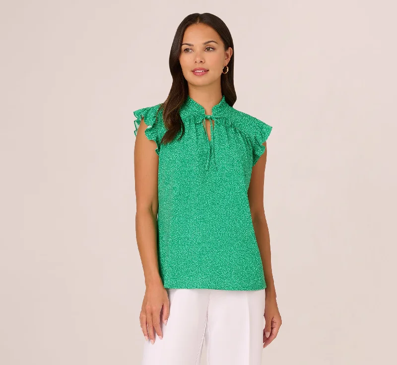 printed-flutter-sleeve-top-with-tie-neck-in-emerald-ivory-micro-dot-ad1s301640