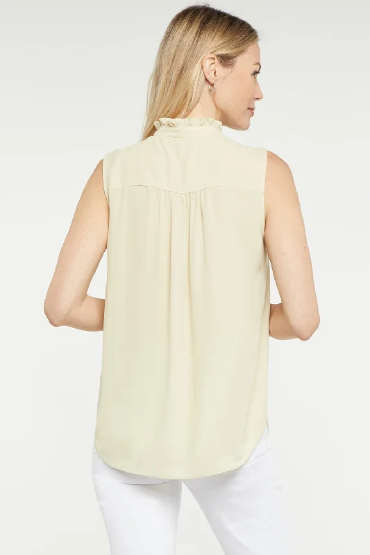 sleeveless-ruffle-neck-blouse-butter