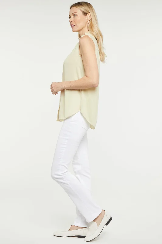 sleeveless-ruffle-neck-blouse-butter