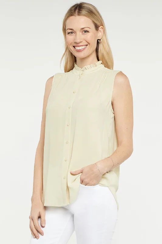 sleeveless-ruffle-neck-blouse-butter